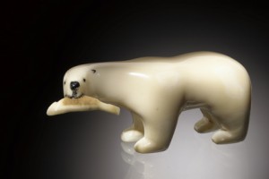 An ivory polar bear carved by Moses Pungowiwi (Siberian Yupik), St. Lawrence Island, Bering Strait, Alaska, ca. 1955. From the Indian Arts and Crafts Board Collection, Department of the Interior, at the American Indian Museum. (Photo by Ernest Amoroso)