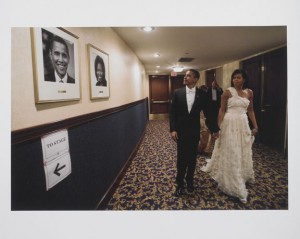 The president and first lady passing their portraits on their way to the Youth Ball at the  Washington Hilton. (Photo by David Hume Kennerly)
