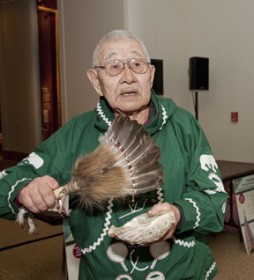 Elder Paul John, a member of the Toksook Bay Village Council, blesses the exhibition hall. (Photo courtesy of Ann Knaup)
