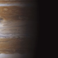 Io High Above Jupiter's Storms