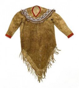This man’s tunic, made of moose hide with long fringes and colorful beadwork, is a style that Alaskan Athabascans stopped making around the end of the 19th century. Before glass beads became available from fur traders, women embroidered tunics with dyed porcupine quills. Athabascan, 1882