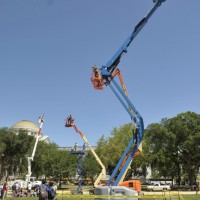 Photographers perched on cranes will record the crowd as the form the Smithsonian sunburst.