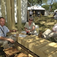 From left, Jeff Schneider, Smithsonian Gardens, Mickey Lanigan, Office of Facilites Engineering and Operations; and Amber Carlberg, OFEO; enjoy the shade.