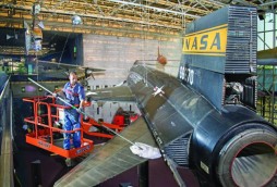 Harrison Jones, a member of the objects cleaning crew of the National Air and Space Museum, dusts the X-15 aircraft hanging in the Milestones of Flight Gallery. (Photo by Eric Long)