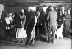 Members of the Gullah community in Georgia express their spirituality through the “ring shout” during a service at a local “praise house” ca. 1930s. (Photo courtesy of  Lorenzo Dow Turner Papers, Anacostia Community Museum Archives)