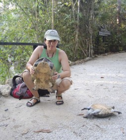 Gracia González-Porter holds a Central American river turtle at the Belize Zoo.