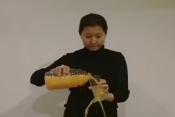 Still from "Drinking (Self-Portrait)" by Hye Yeon Nam, single channel video, running time 03:44 minutes, 2006. Collection of the artist © Hye Yeon Nam