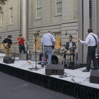 The Red Castle Blues Band. From left, Philip LoPiccolo on guitar (Office of Government Relations); Phil Termini, harmonica; Assistant General Counsel Craig Blackwell, guitar and vocals; Brian Smedley, drums; and Dave Warren, bass.