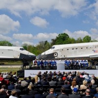 Space Shuttles Enterprise, left, and Discovery meet nose-to-nose at the beginning of a transfer ceremony at the Smithsonian's Steven F. Udvar-Hazy Center, Thursday, April 19, 2012, in Chantilly, Va.