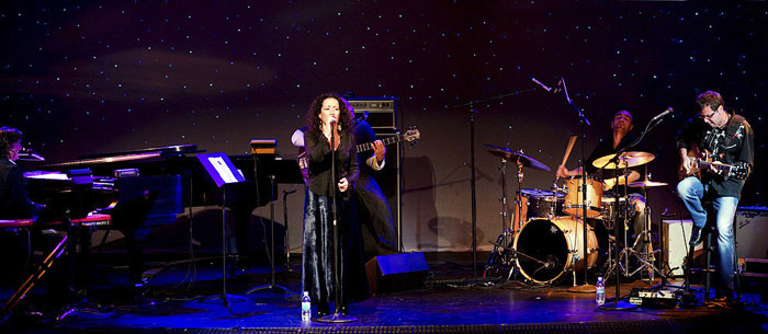 Claudia Acuna in performance at the Triple Door in Seattle in 2009. (Photo courtesy  of Daniel Sheehan, eyeshotjazz.com)