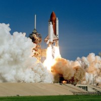 Space Shuttle Discovery soars away from Launch Pad 39A at the Kennedy Space Center