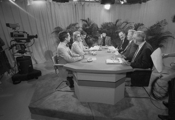Panelists and moderator for the BioDiversity teleconference. From left: Thomas Lovejoy (World Wildlife Federation), Joan Martin-Brown (United Nations Environment Programme), Edward O. Wilson (Museum of Comparative Zoology, Harvard), Maureen Bunyan (moderator, WUSA-TV), Paul Ehrlich (Stanford University), Michael Robinson (NZP) and Peter Raven (Missouri Botanical Garden) (Photo by Dane Penland as featured in the Torch, November 1996)