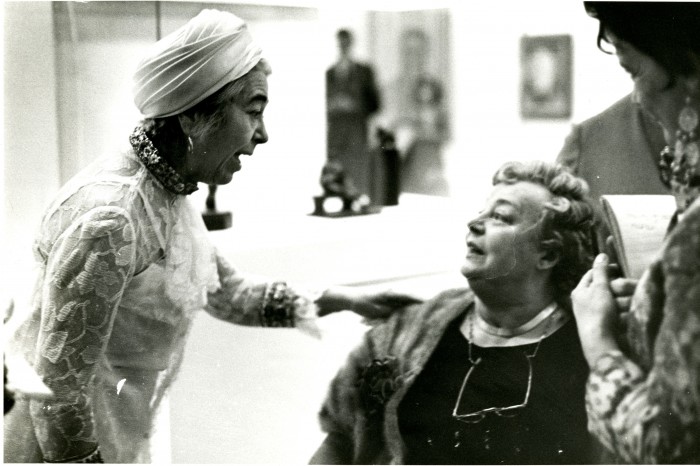 Edith Halpert, on the left, and Mrs. Charles Sheeler, seated, chat during the opening of the memorial exhibition of the work of Charles Sheeler at the National Collection of Fine Arts, now the Smithsonian American Art Museum, on October 9, 1969. Charles Rettew Sheeler, Jr. (July 16, 1883 - May 7, 1965) was an American artist. He is recognized as one of the founders of American modernism and one of the master photographers of the 20th century