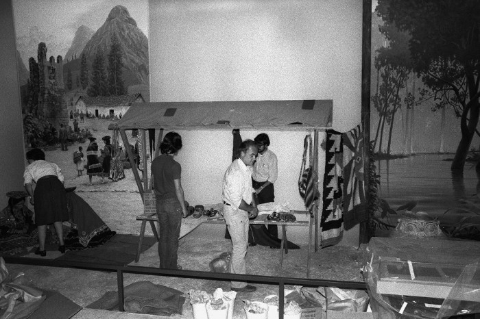 America: Continent and Culture," in the National Museum of Natural History. From left: Susan Wallace, Dr. Geoffrey Conrad, Tom Thill, and Steven Makovenyi. (Photo by Vincent Connolly, as featured in the Torch, December 1975 