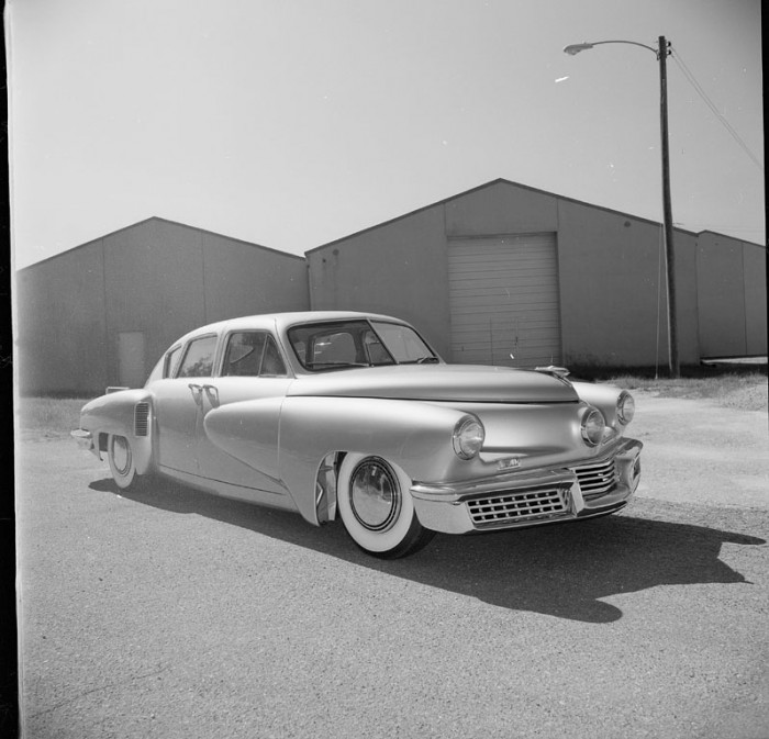 This rare 1948 Tucker automobile was acquired by the National Museum of American History for its transportation collection. The car was designed by Preston Tucker, Alex Tremulis, and a team of stylists and engineers. It is one of only 51 such cars produced by Tucker Corporation before Preston Tucker became embroiled in fraud allegations. The car was seized in 1992 as the result of a Drug Enforcement Administration investigation into an illegal narcotics manufacturing operation. It was presented to the Museum in a brief ceremony on October 8, 1993 by the U.S. Marshals Service. (Photo by Jeff Tinsley, as featured in the Torch, December 1993)