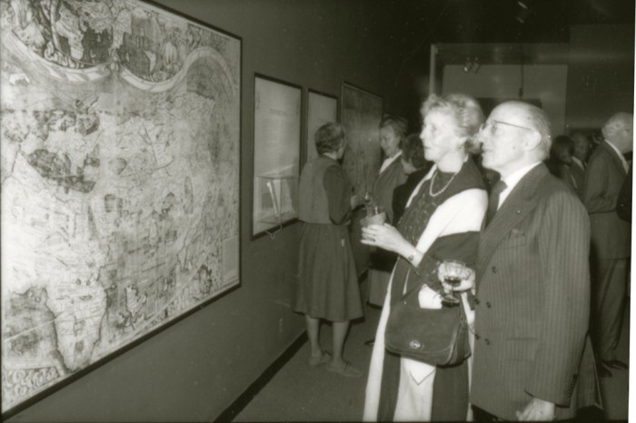 Visitors View the World Map of Martin Walkdseemuller at "The Naming of America"