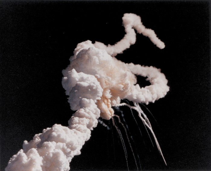 The smoke plume from Space Shuttle Challenger's in-flight breakup, which resulted in its crash and the deaths of all seven crew members. (Image via Wikipedia Commons)