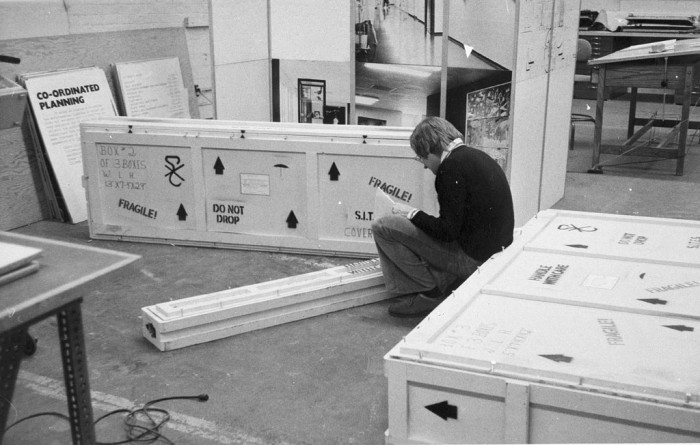Dennis Gould, Smithsonian Institution Traveling Exhibition Service director, making a final check of crates at the Smithsonian's 24th Street facility, as featured in the Torch, May 1974.