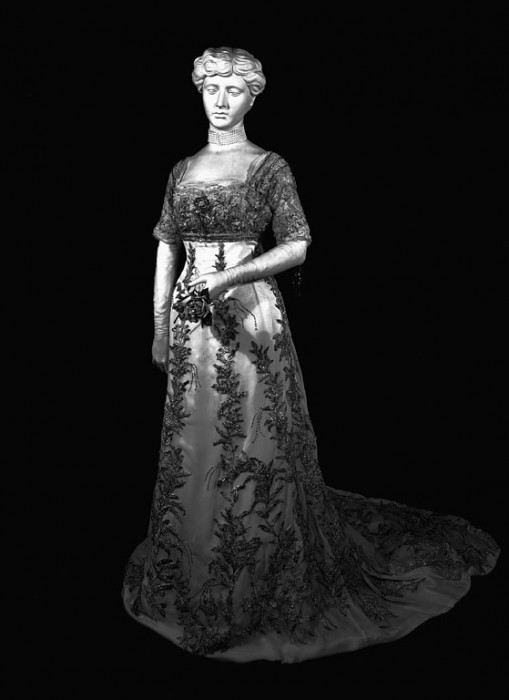 Black and white photo of Taft gown on exhibit