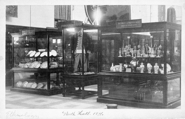 The relics of George Washington on exhibit as part of the Ethnology exhibit in the North Hall of the United States National Museum, 1891 (now the Arts and Industries Building). Washington's relics were one of the earliest collections of the United States National Museum