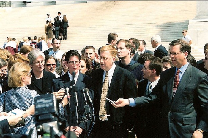 Paul Smith wearing the lucky necktie, with Lambda Legal Defense Fund attorney Ruth Harlow on his right, after arguing the case before the Supreme Court, 2003. 