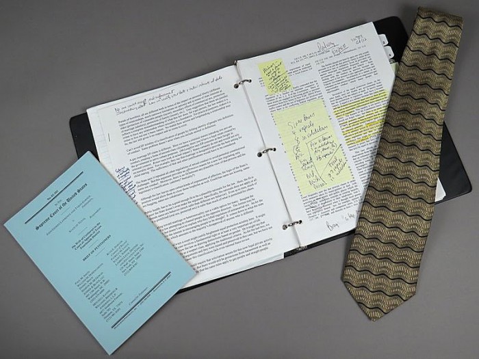 Attorney Paul Smith donated objects from the Lawrence v. Texas case to the American History Museum, including the notebook he used at the podium, the neck-tie he wore that day, and a copy of the legal brief. 