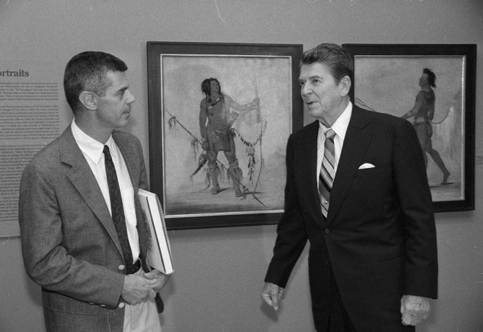 William Truettner, Curator of 18th and 19th Century Painting and Sculpture at the National Museum of American Art, now known as the Smithsonian American Art Museum, and President Ronald Reagan. (Photo by Kim Nielsen, as featured in the Torch, September 1981)