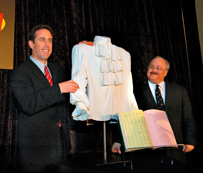 Jerry Seinfeld visited the museum in 2004 to donate the puffy shirt. Curator Dwight Blocker Bowers accepts the donation.