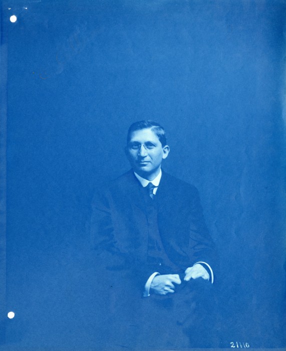 Cyrus Adler sits with his hands, a little further apart, in his lap. Adler was the honorary assistant curator for the Department of Semitics at the United States National Museum of the Smithsonian Institution in Washington, D.C., from 1888 until 1893. At the Smithsonian, Adler also served as curator of Historic Archaeology and Historic Religions from 1889 to 1898, librarian from 1892 to 1905, and assistant secretary from 1905 to 1908