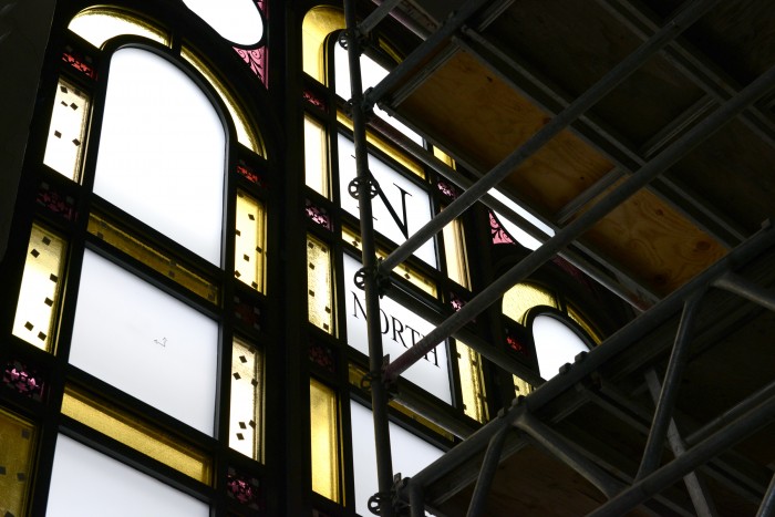 The compass markings Adolf Cluss designed to appear on the building’s original stained glass windows were restored in this renovation. (Photo by  Brendan McCabe, Smithsonian Magazine)