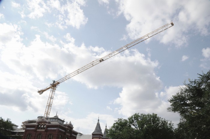 A crane is suspended above the A&I Building. (Photo by Chris Lethbridge)