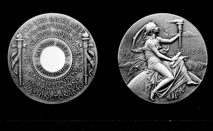 Front and back perspectives of the Samuel P. Langley Medal for Aerodromics, the third oldest medal to be awarded by the Smithsonian Institution. The Langley Medal is in honor of the Smithsonian's third Secretary, Samuel P. Langley (1887-1906) and is given to persons who have made outstanding contributions to the science of aeronautics and astronautics. The medal was authorized by the Board of Regents in 1908 and first presented to the Wright Brothers in 1909