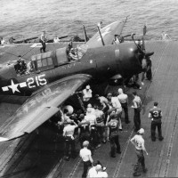 The only known VB-92 Helldiver to be photographed up close, “215” flown by Ensign Bob Sobey, illustrates the geometric symbol scheme of the squadron’s early days on USS Lexington. (Photo courtesy of Robert L. Lawson Photograph Collection, National Naval Aviation Museum)