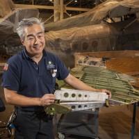 Museum specialist Will Lee fabricated this rudder rib using plans on file in the National Air and Space Museum’s Archives. (Photo by Dane Penland)