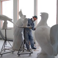 Artist Todd McGrain in his studio. His sculptures of of the Carolina parakeet, the Labrador duck, the great auk, the heath hen and the passenger pigeon will be on display in the Enid A. Haupt Garden through March 15, 2015. (Photo courtesy of The Lost Bird Project)