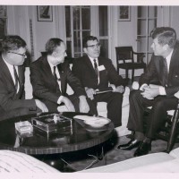 President John F. Kennedy meeting with National Congress of American Indians president Walter Wetzel, Sen. Lee Metcalf and Sen. Mike Mansfield, 1963. (Photo probably by Robert L. Knudsen / National Museum of the American Indian)