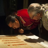 Faithkeeper of the Turtle Clan of the Onondaga Nation of the Haudenosaunee Confederacy Oren Lyons, Ph.D., (right), and The Tadodaho of the Haudenosaunee Confederacy Chief Sidney Hill, examine the signature of Ki-On-Twog-Ky, also known as Cornplanter (Seneca), on the Treaty of Canandaigua of 1794 at the Smithsonian's National Museum of the American Indian on Monday, Sept. 8, 2014 in Washington, D.C. (Photo by Kevin Wolf/AP Images for The Smithsonian's National Museum of the American Indian)