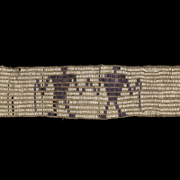 Wendat (Huron) wampum belt, 1600−50, Indian Territory (Kansas) Whelk shell, quahog shell, hide, bast fiber yarn, cordage (Photo by Ernest Amoroso)