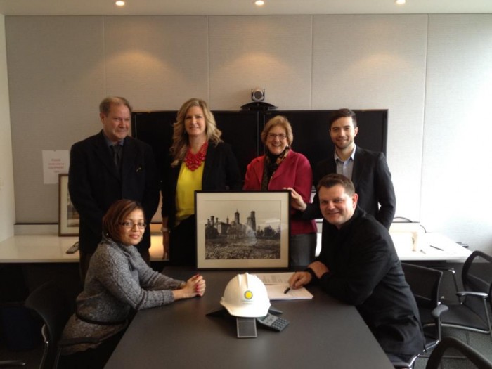 Members of the core planning team pose for a photo after signing the contract for the design of the South Mall Master Plan. From left (standing) Christopher Lethbridge, Office of Planning Design & Construction; Michelle Spofford, OPDC; Ann Trowbridge, OPDC; Daniel Kidd, Bjarke Ingels Group. Seated: Christine Grant, Office of Contracting, Kai-Uwe Bergmann, BIG