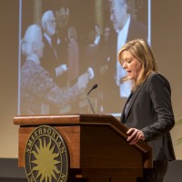 Karen Keller, director of the Office of Special Events and Protocol, describes the many star-studded events the Smithsonian has hosted during Dr. Clough's tenure. (Photo by Wayne Clough)