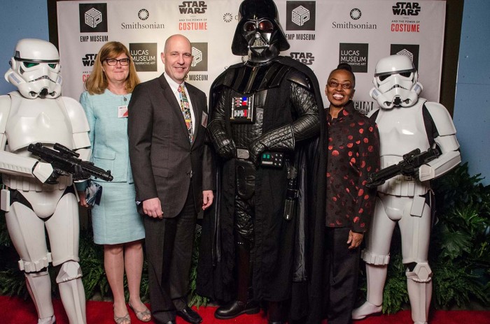 From left, unidentified Imperial stormtrooper; Myriam Springuel, interim director of the Smithsonian Traveling Exhibition Service; Acting Secretary Al Horvath; Supreme Commander of the Imperial Forces Darth Vader; Claudine Brown, Assistant Secretary for Education and Access; and an unidentified Imperial stormtrooper. (Photo by Brady Harvey, courtesy of EMP Museum)