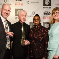 Anthony Daniels, the actor who brings to life the golden protocol Droid C-3PO, admires Acting Secretary Al Horvath's choice of tie. To Daniels' right are Claudine Brown and Myriam Springuel. (Photo by Brady Harvey, courtesy EMP Museum)