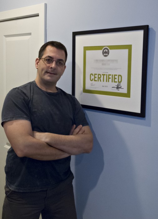 James Di Loreto proudly displays his home’s LEED certification. (Photo by James Di Loreto)