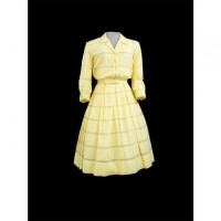 The yellow housedress worn by January Jones as Betty Draper in season 1, episode 4 of “Mad Men.” (National Museum of American History)