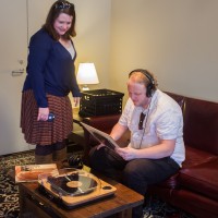 Visitors enjoy the "New Harmonies" exhibit on its opening night at the Birthplace of Country Music Museum, March 2015. (Photo by Haley Hensley, BCMM)