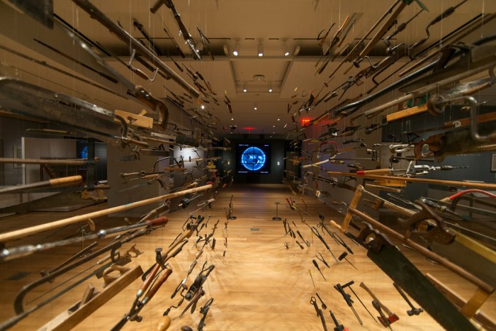 Damian Ortega's "Controller of the universe" is part of the redesigned Cooper Hewitt, Smithsonian Design Museum, which reopened in December 2014 after an extensive renovation, Behind this piece you can see video images of the sun, streamed live from NASA's Solar Dynamics Observatory. (Photo by Fred R. Conrad / The New York Times)
