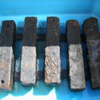 Iron ballast recovered from the São José slave ship wreck undergoing treatment. The ballast was used to weigh down the slave ship and its human cargo. Photo courtesy Iziko Museums