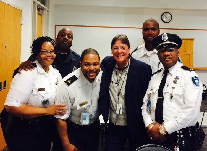 Dee Walker (fourth from left) with officers from the Office of Protective Services.