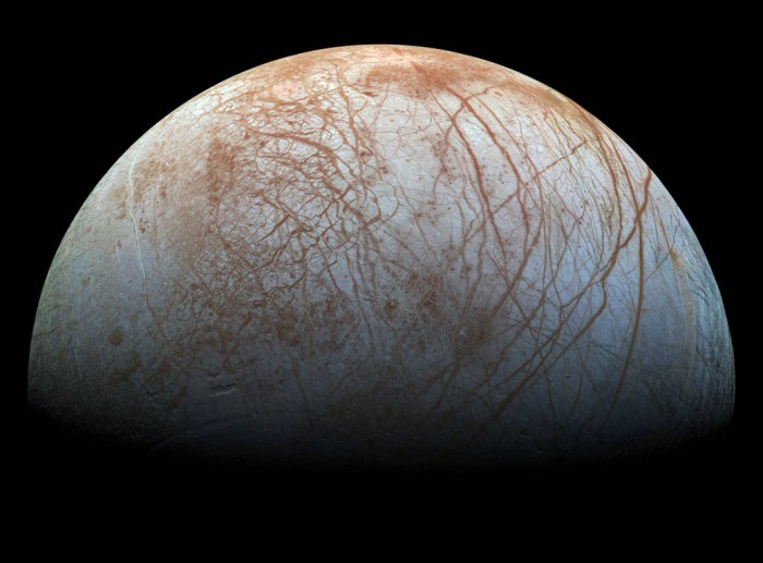 The puzzling, fascinating surface of Jupiter’s icy moon Europa looms large in this newly-reprocessed color view, made from images taken by NASA's Galileo spacecraft in the late 1990s. The scene shows the stunning diversity of Europa’s surface geology. Long, linear cracks and ridges crisscross the surface, interrupted by regions of disrupted terrain where the surface ice crust has been broken up and re-frozen into new patterns. (Image credit: NASA/JPL-Caltech/SETI Institute)