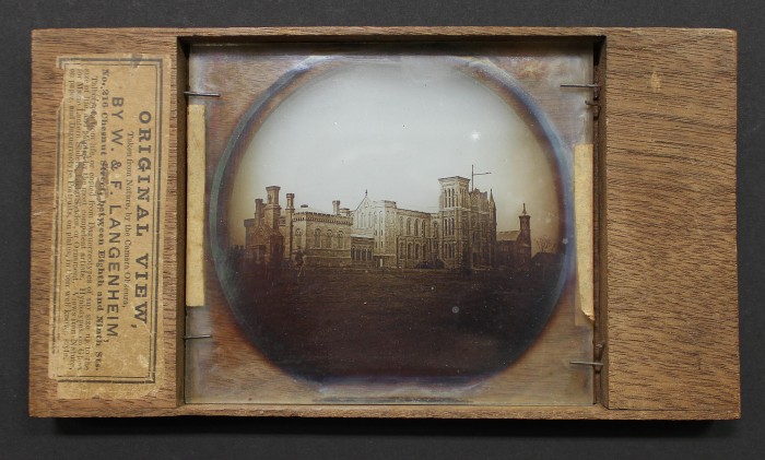 Lantern slide photograph on glass in wood mount of Smithsonian Institution Building under construction, William Langenheim (1807 - 1874) and Frederick Langenheim (1809-1879) Philadelphia, 1850. Smithsonian Castle Collection, gift of Tom Rall, Arlington, Virginia